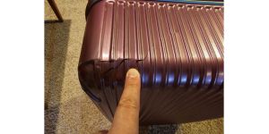 Cathay Pacific Airways - Flight delay, damaged baggage, no response