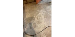 ServPro - Basement storage/utility room cement floor cleaning