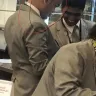 Etihad Airways - person on check in desk