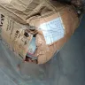 Singapore Post (SingPost) - Service. Parcel received with missing items and trash/ paper booklets inside the box.