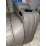 Ashley HomeStore - $3200 loveseat delivered with hole in arm.