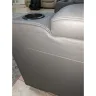 Ashley HomeStore - $3200 loveseat delivered with hole in arm.