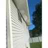 Power Home Remodeling - Soffit not nailed in and falling endangering homeowner and visitors