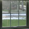 Renewal by Andersen - Exterior glass pane severe staining