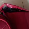 Oman Air - complaint about baggage handling and the damage caused to the check-in baggage.