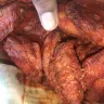 Wingstop - feathers left on chicken
