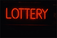 Four people held in lottery scam case