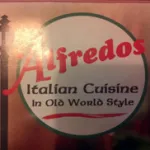 T K Alfredos Pizza & Grill Logo