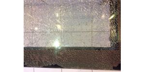 Fisher & Paykel Appliances - glass door of oven (electric) new 2007, exploded. glass looks like a thousand spider webs. edge of glass is in pieces