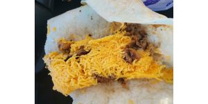 Del Taco - Portions and window guy stuck his finger IN HIS NOSE