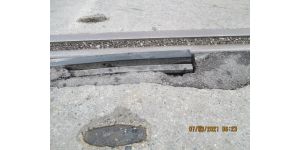 Long Island Rail Road [LIRR] - Track Crossing Road, Part of Track support came loose see photo's