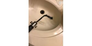 American Home Shield [AHS] - ac service caused my faucets to overflow/plumbing uncovered