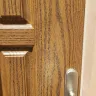 Menards - entry door panel - defects in staining finish & glue adhesive