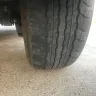 Toyota - tires bald inside 50,000km
