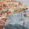 Roman's Pizza - hazardous object in our pizza and bad customer care