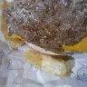 McDonald's - roach sack and looks like a piece of wood soak up in burger