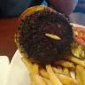 Ruby Tuesday - burnt burger - Photo 1