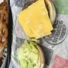 Burger King - served a burger with cold cheese asked for a new one... came out exactly the same - Photo 1