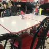 Steak 'n Shake - food on tables and very dirty restaurant