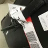 Singapore Airlines - damaged baggage - Photo 1