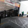 Shell - smoking in front of entrance. with apron on. how nasty could that get. it grossed me out. - Photo 1