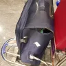 Singapore Airlines - damaged luggage - Photo 1