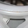 Kenmore - elite washer rusting at bleach tray, dryer cause black stains on clothing - Photo 1