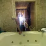 Americas Best Value Inn - customer service and room - Photo 1