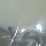 Sealtest / Agropur Dairy Cooperative - 4 litre bag of sealtest agropur milk (3.25% m.f.) a 5 mm. black bug was found in one of the three clear plastic bags of milk - Photo 1