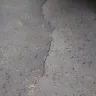 Bell - cracking driveway caused by underground wires installed 2018 - Photo 2