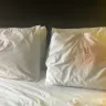 Americas Best Value Inn - dirty bed sheets - Photo 1