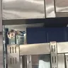 Red Rooster Foods - staff openly eating with gloves on.. not official uniform either? - Photo 1