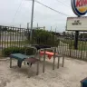 Burger King - laundry being dried outside on tables