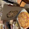 Shakey's Pizza - my toppings were stuck on the cover of the cardboard!!