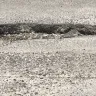 Dollar General - parking lot dangerous - Photo 1