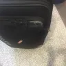 Caribbean Airlines - suitcase - Photo 1