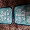Dollar Tree - square pot holders (teal) with quote "the best things in life aren't things"