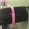 Singapore Airlines - duty free confiscation - damaged suitcase