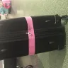 Singapore Airlines - duty free confiscation - damaged suitcase - Photo 1