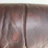 Leon's Furniture - peeling of leather couch - Photo 1