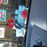 Circle K - employee sitting on the cases of water.