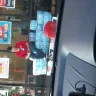 Circle K - employee sitting on the cases of water.