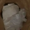 Carl's Jr. - found used sanitation gloves disposed in my bag - Photo 1