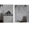 Adidas - defective product - logo faded on first wash