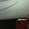Alamo Rent A Car - cracked on driver side of the window - Photo 1