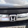 Honda Motor - wrv car front chromium with honda monogram is rusted