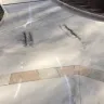 UPS - delivery truck damaging driveway - Photo 1