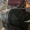 Oman Air - ripped bag with missing items - Photo 1