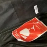 Oman Air - ripped bag with missing items - Photo 2