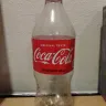 Coca-Cola - tasted weird and bottle had metal smell